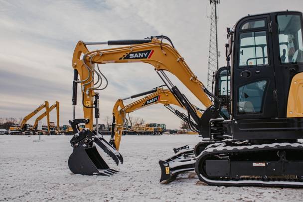 SANY SY35U excavators in a lot with bucket attachments