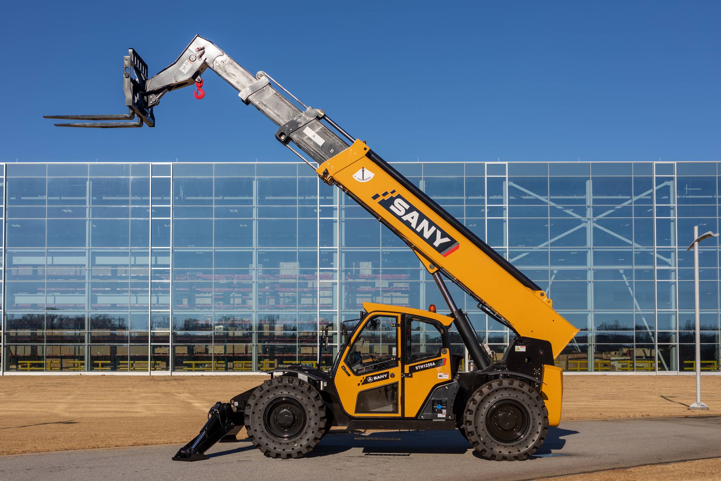 Understanding Telehandlers: From Weight to Lifting Capacity | Newman ...