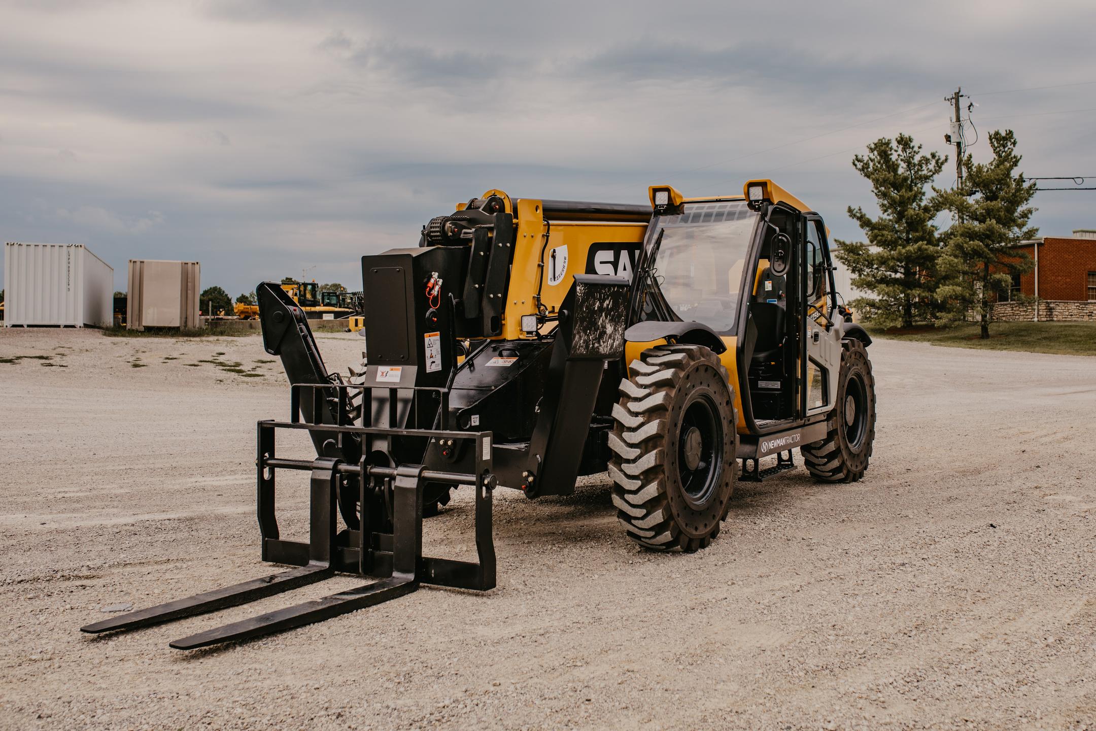 Understanding Telehandlers: From Weight to Lifting Capacity | Newman ...