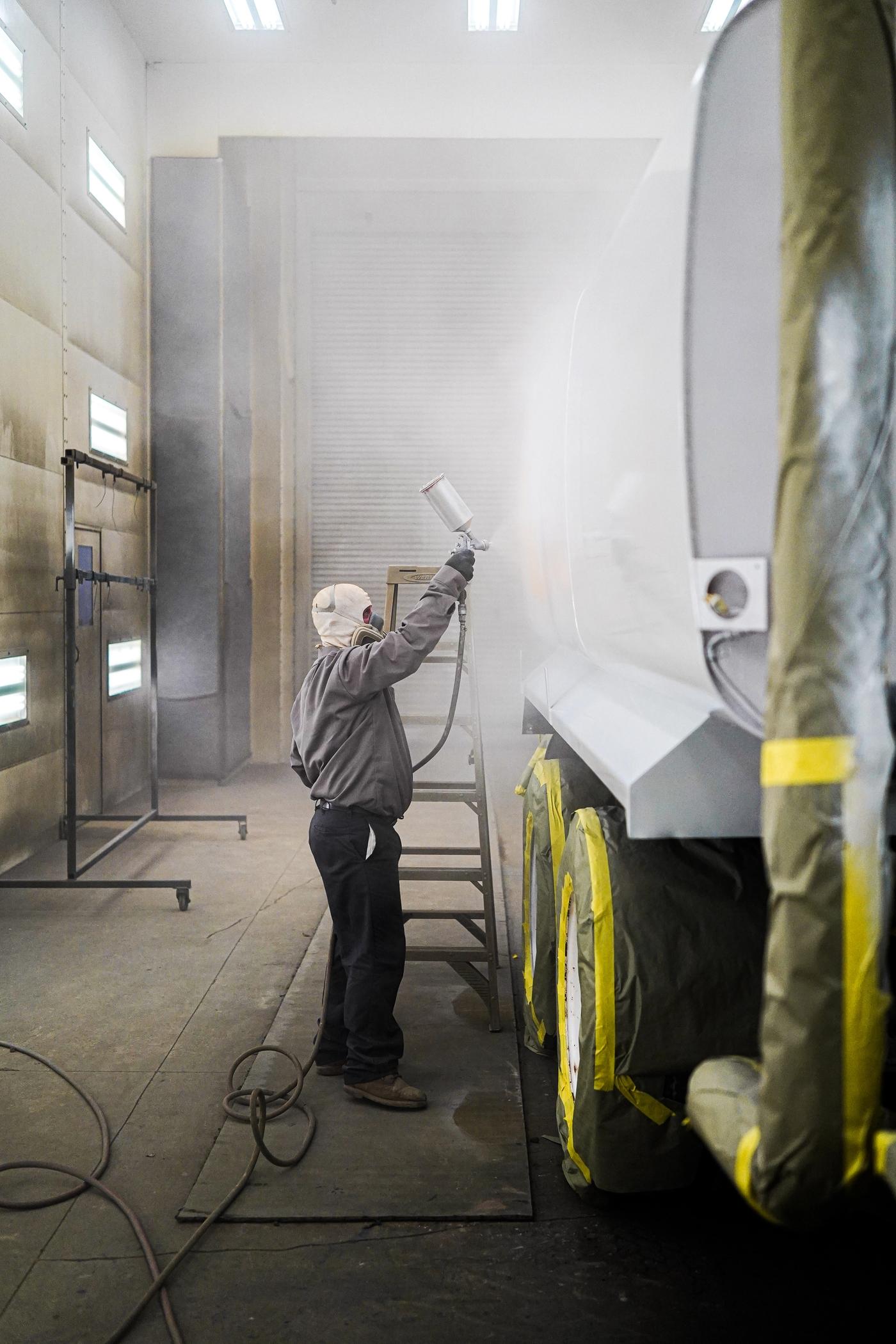 Our World Class Heavy Equipment Paint Booth - Background Image