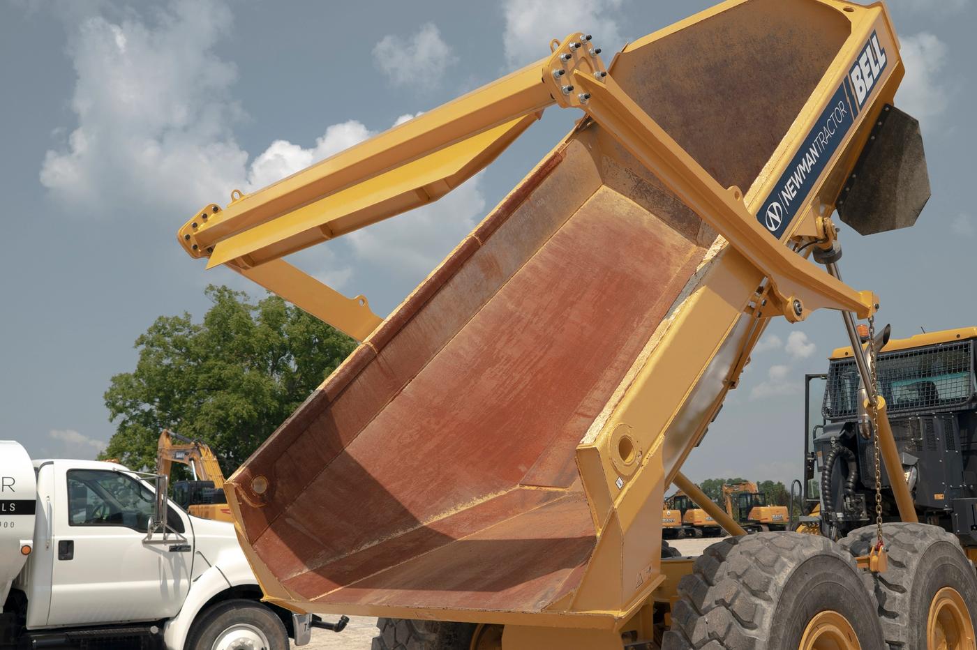 Bell-Articulated-Trucks-For-Sale - Background Image