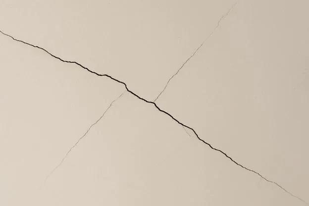 Ceiling Cracks Near Beams: DIY or Call an Engineer?