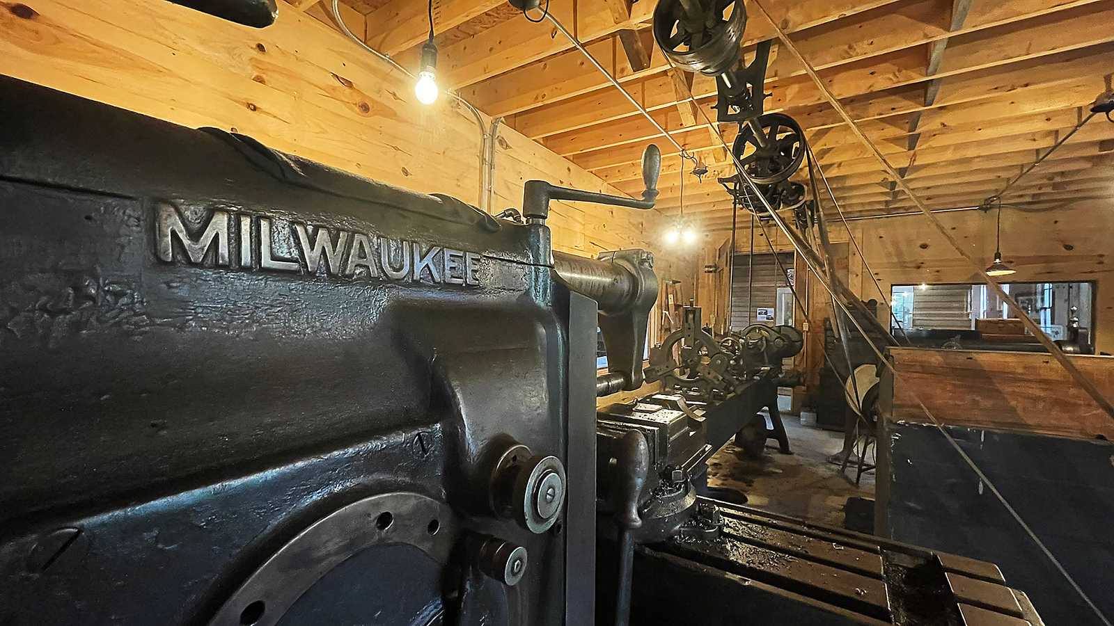 Lineup of all the belt-driven machines in the Grady machine shop