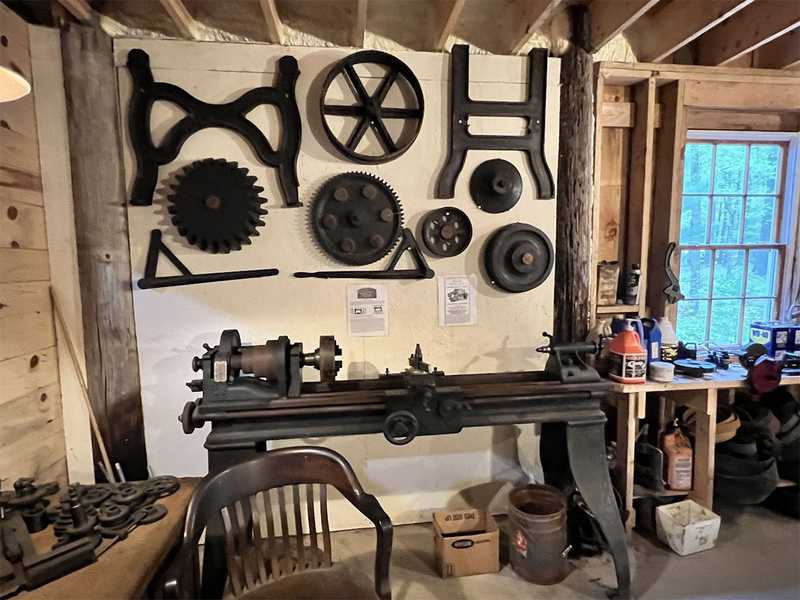 Corner of machine shop showing lathe