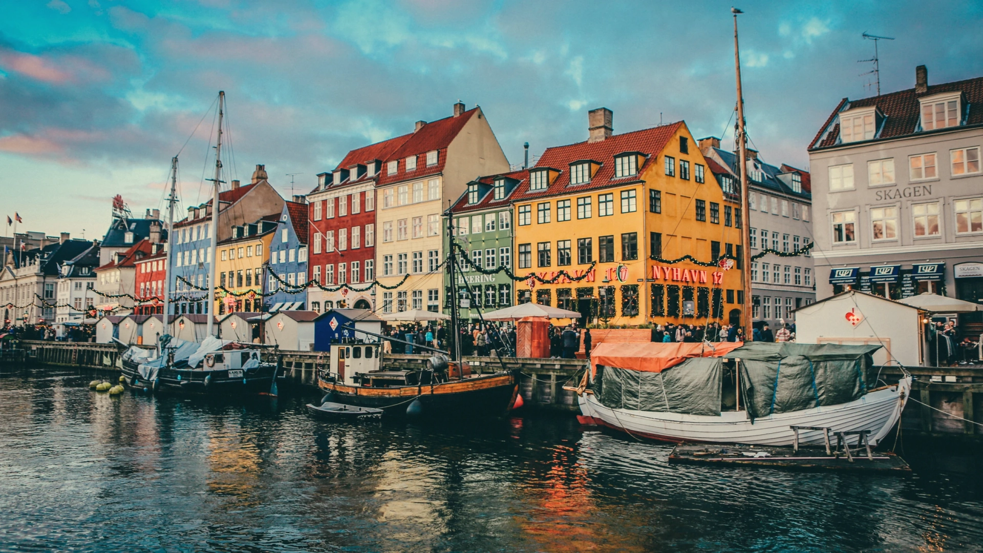 Copenhagen Nyhavn colorful 17th century facades reflected in still water