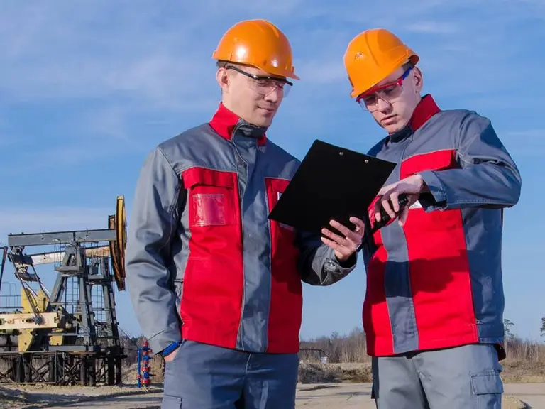 Technician using Oil and Gas Field Service Software