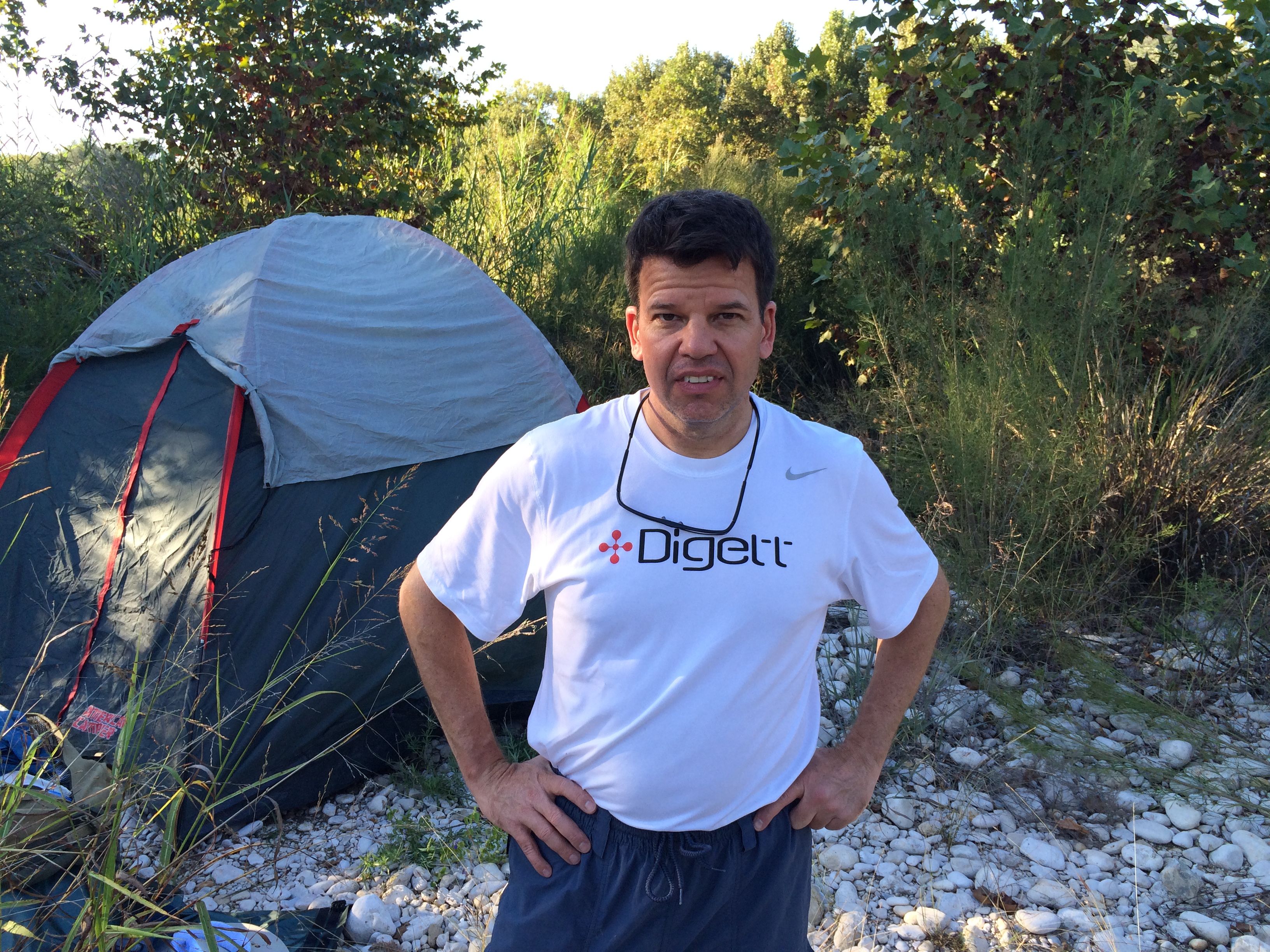 Mark Figart wearing a Digett t-shirt while camping outdoors