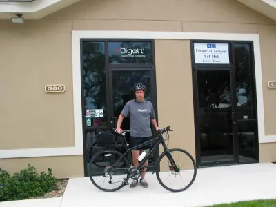 Mark Figart with bicycle outside the original Digett office