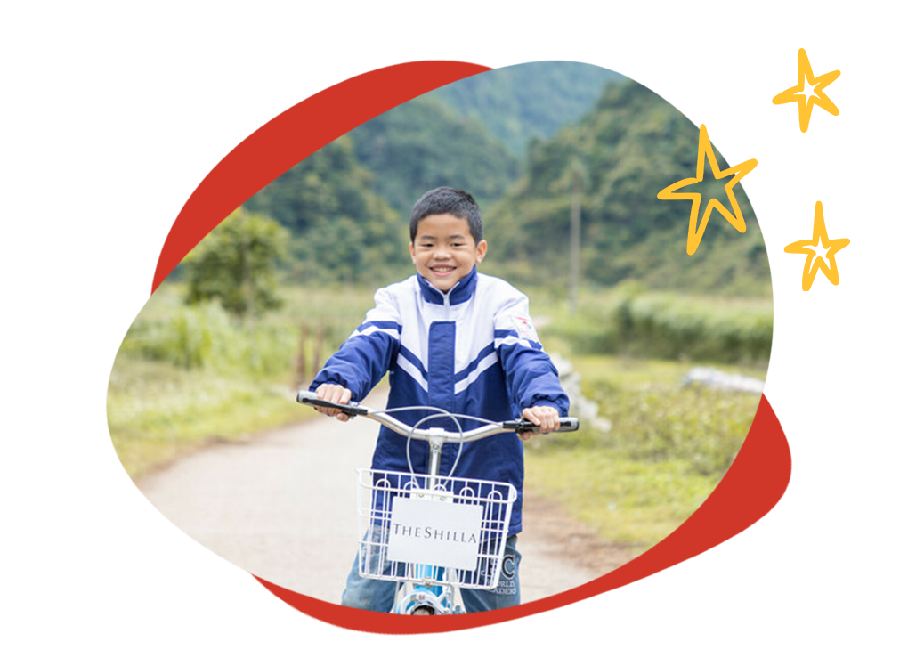 child riding bike in vietnam