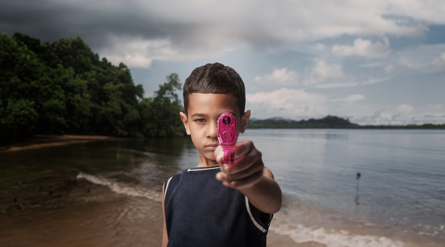 child with water gun