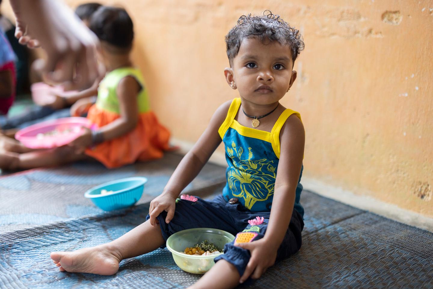 Child eating in Sri Lanka