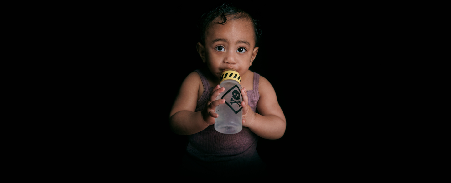 baby with deady water bottle