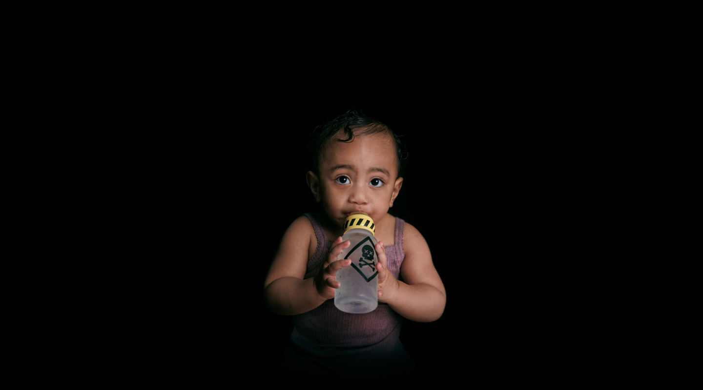 baby with deady water bottle
