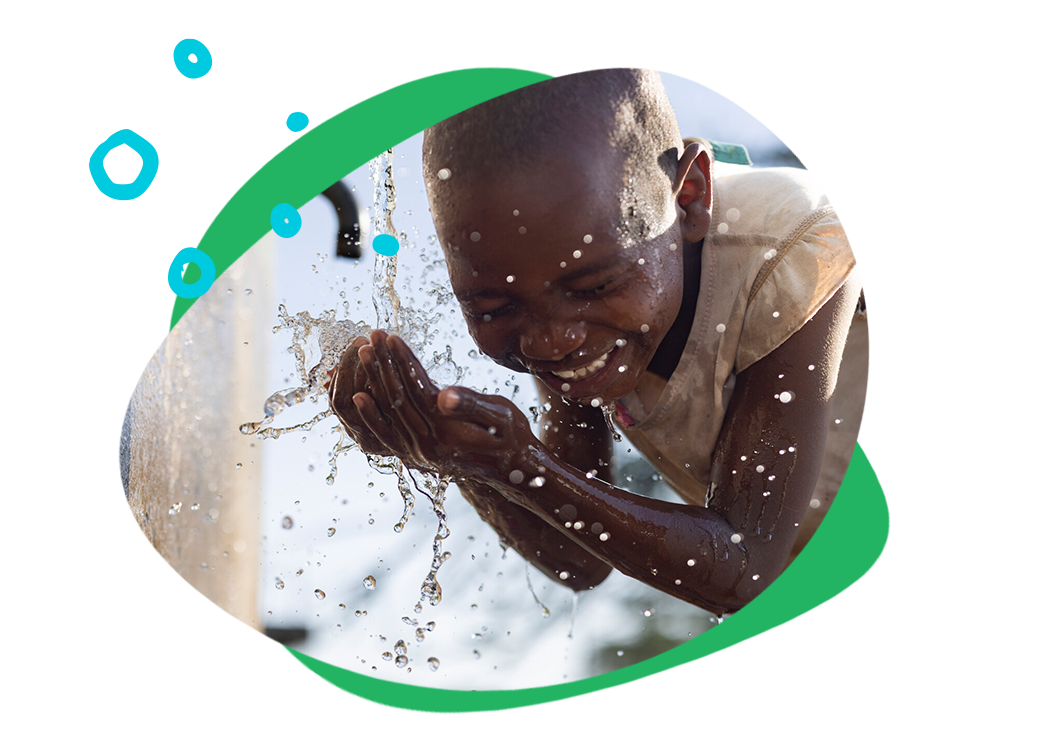 child washing face in Kenya