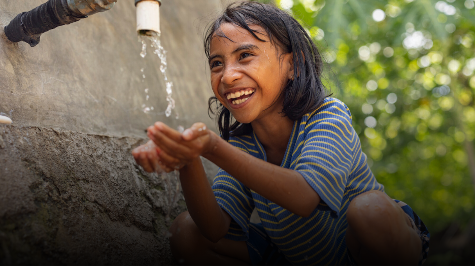 Child with clean, safe water