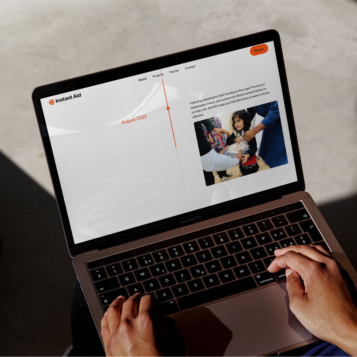 Instant Aid digital timeline shown on a laptop