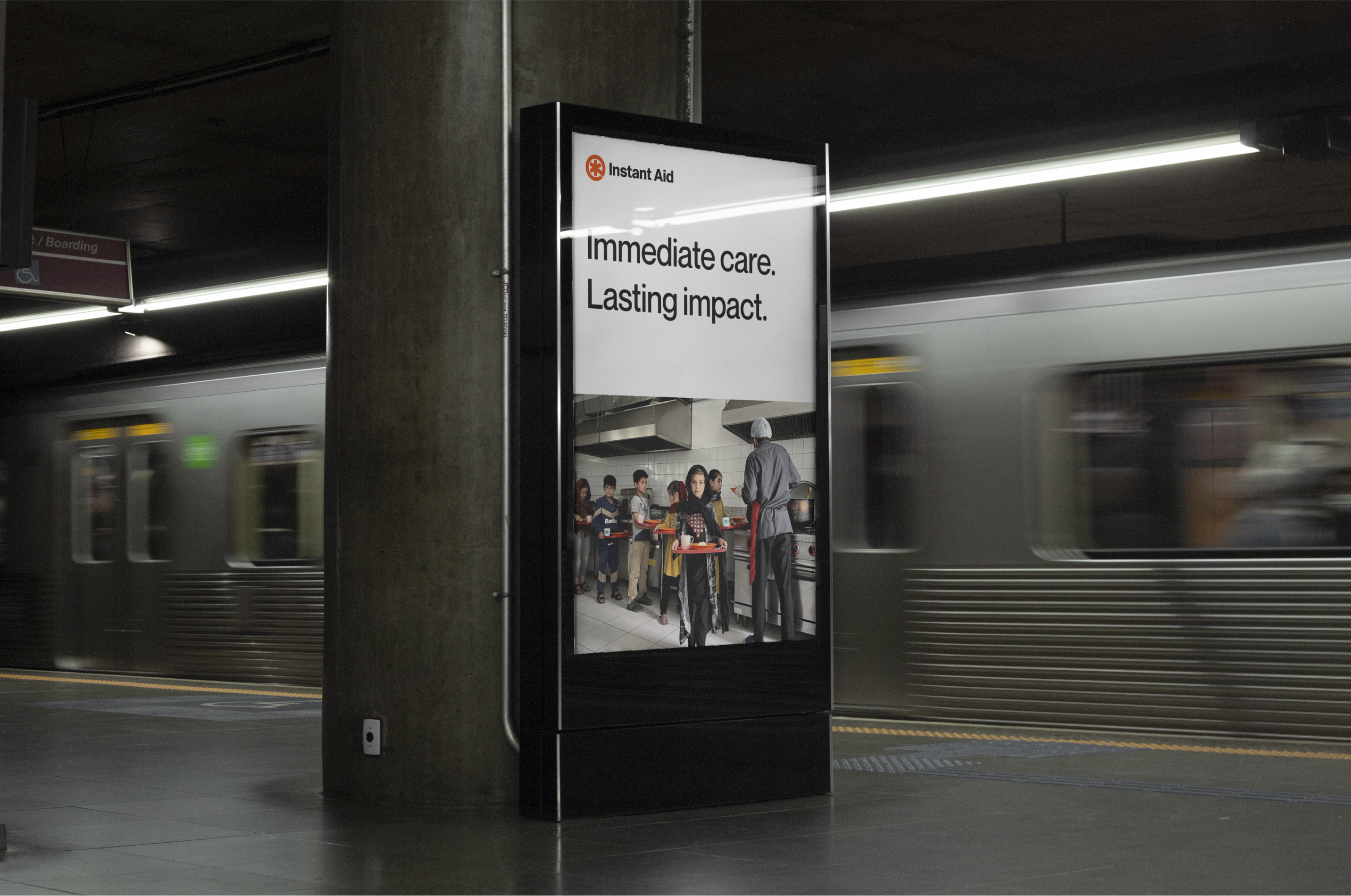 Instant Aid messaging on a billboard in the subway