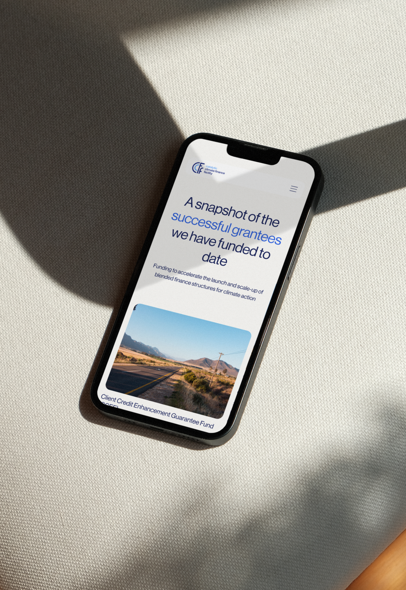 Preview design of the CC Facility website on a mobile device