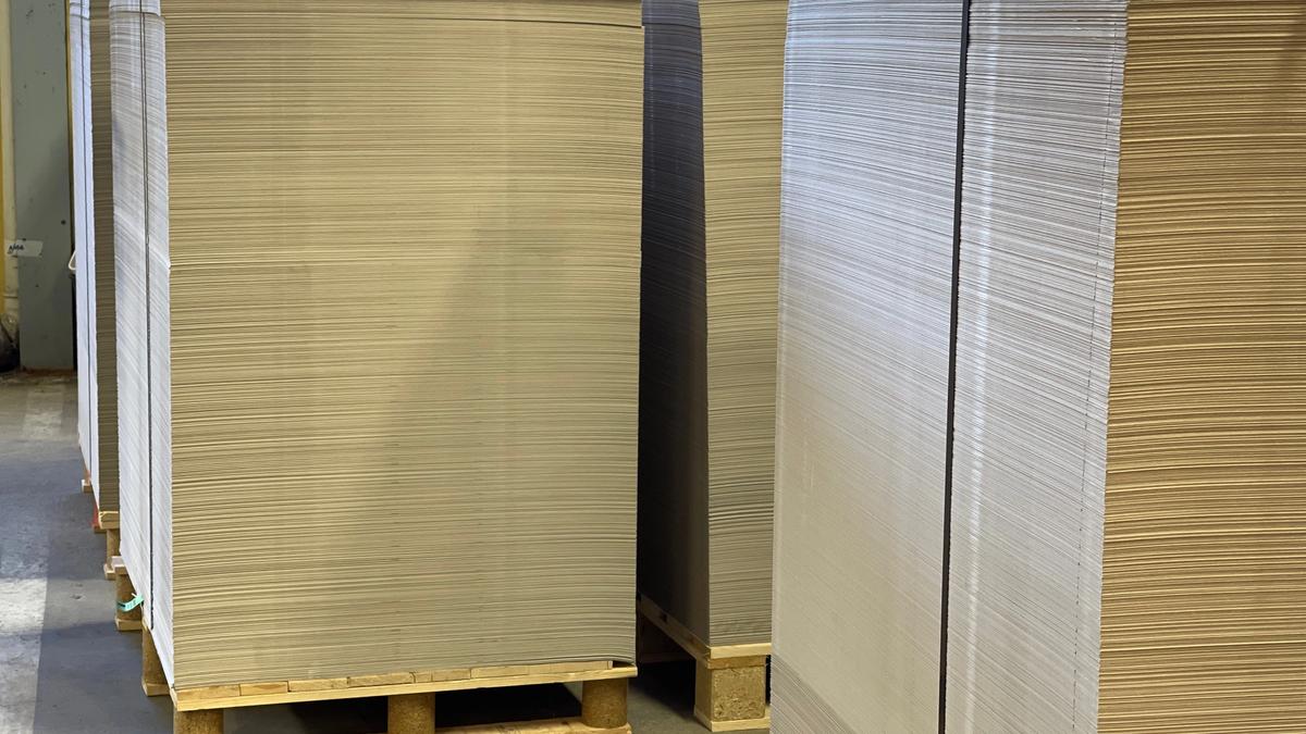 pallets of printed sheets of cardboard