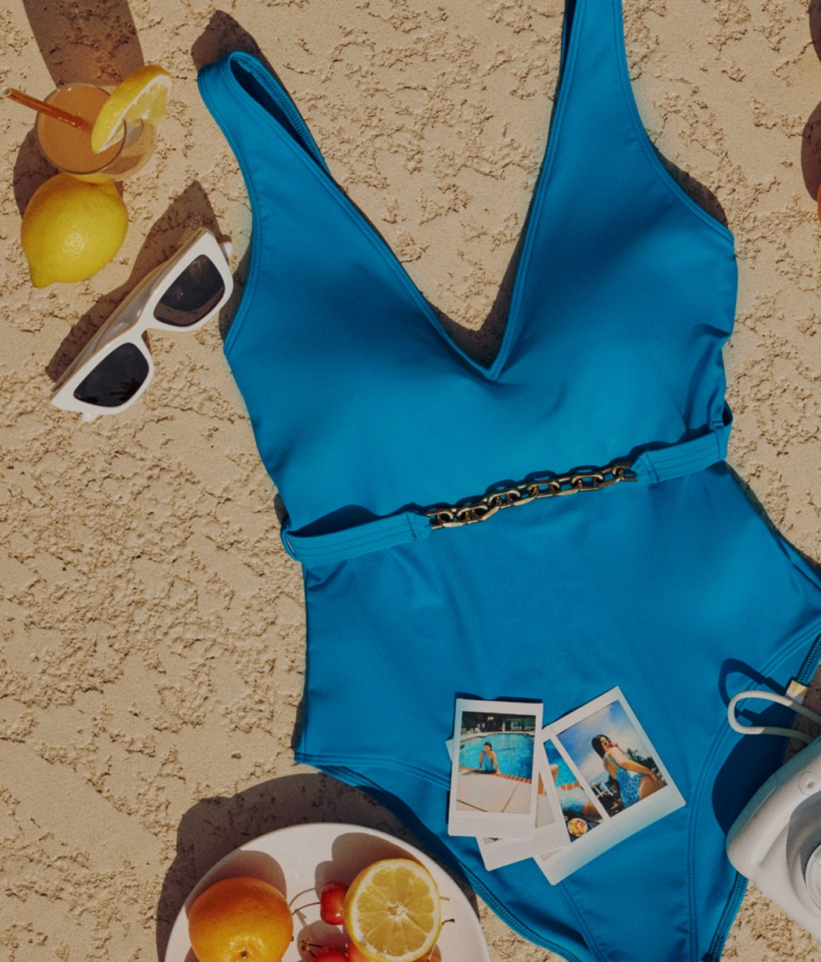 Archive Sale text: One Piece Swimsuit in the sand