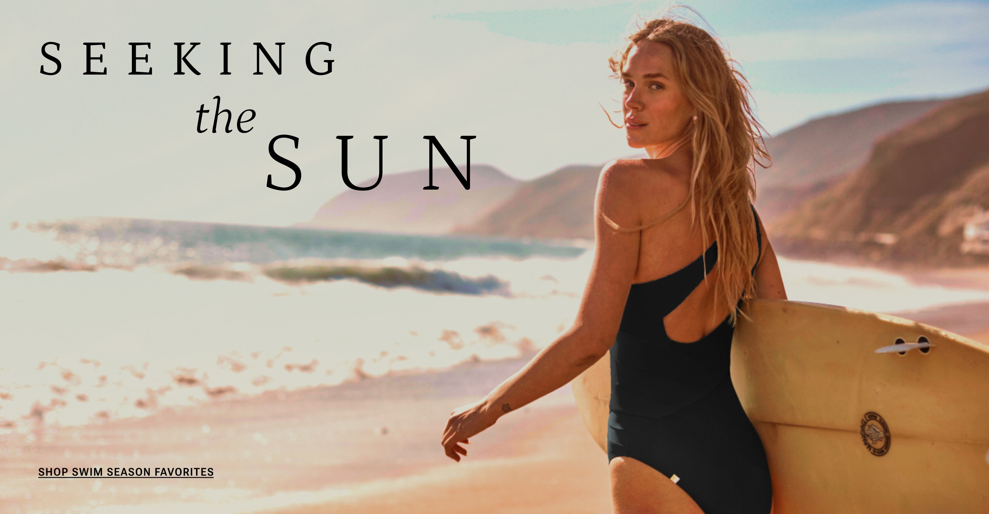 Model in Sidestroke One Piece Swimsuit in Sea Urchin (black)