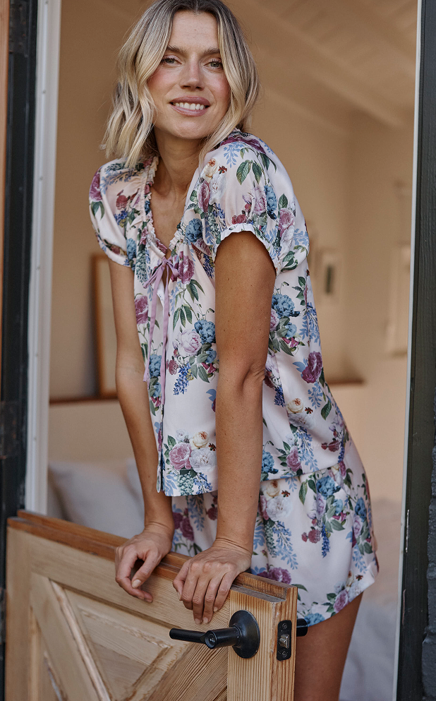 Summersalt x Bridgerton with Liberty Fabrics. Model in Floral Pajamas