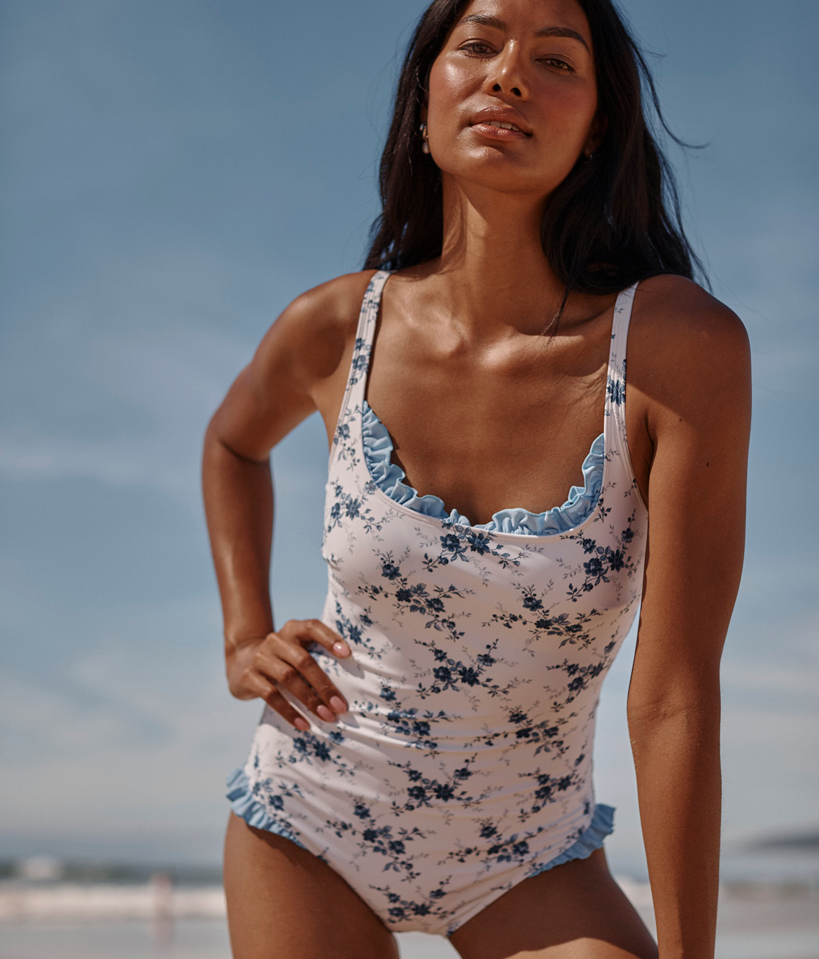 Sale on Sale Text. Model in pink bikini