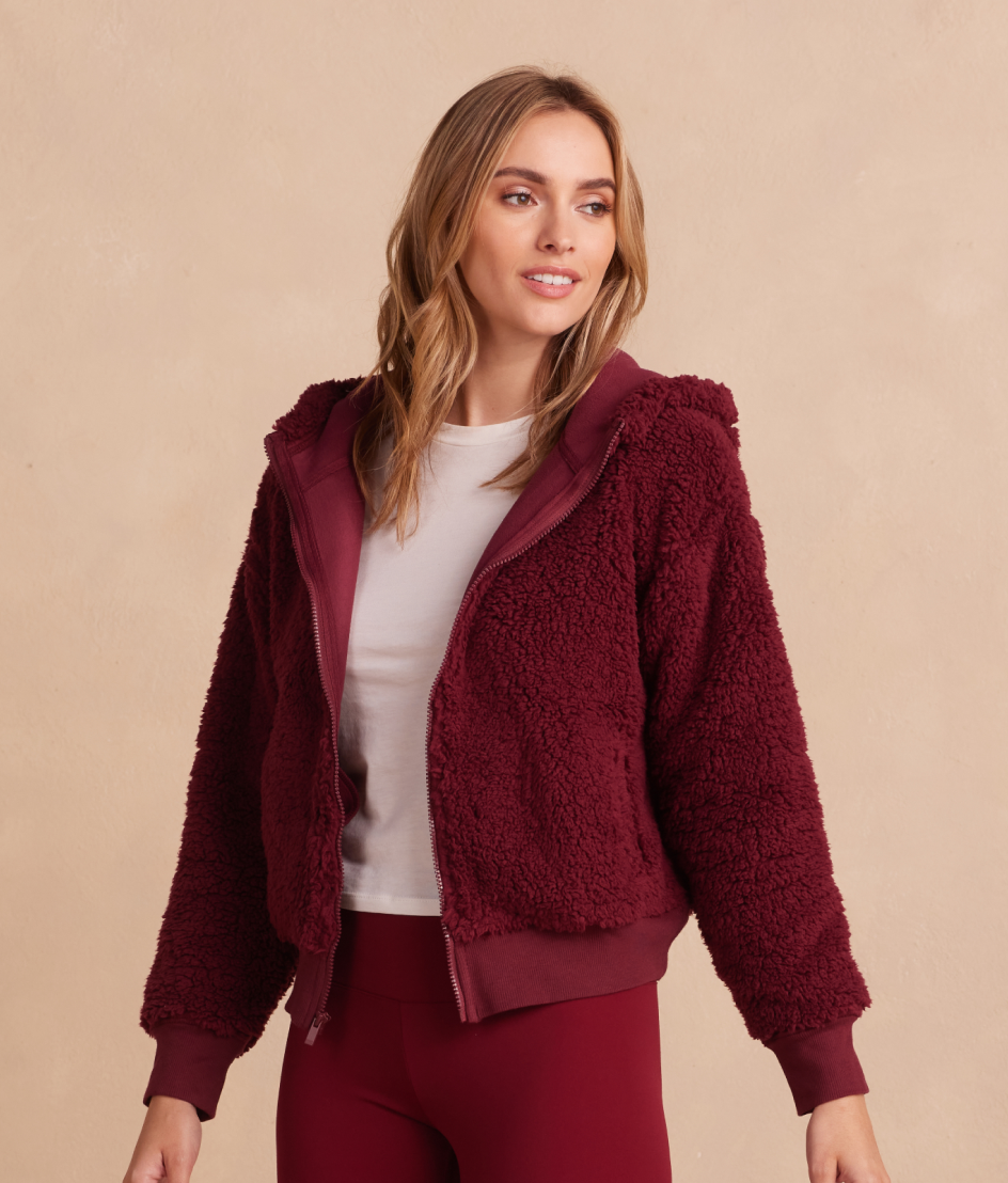 Model in Fleece, The High Pile Eco Fleece Cropped Hoodie - Pinot (Red)