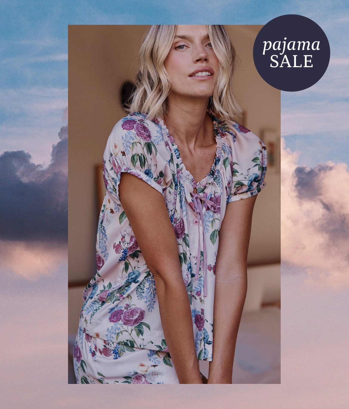 40% off pajamas. Model in floral pajama set