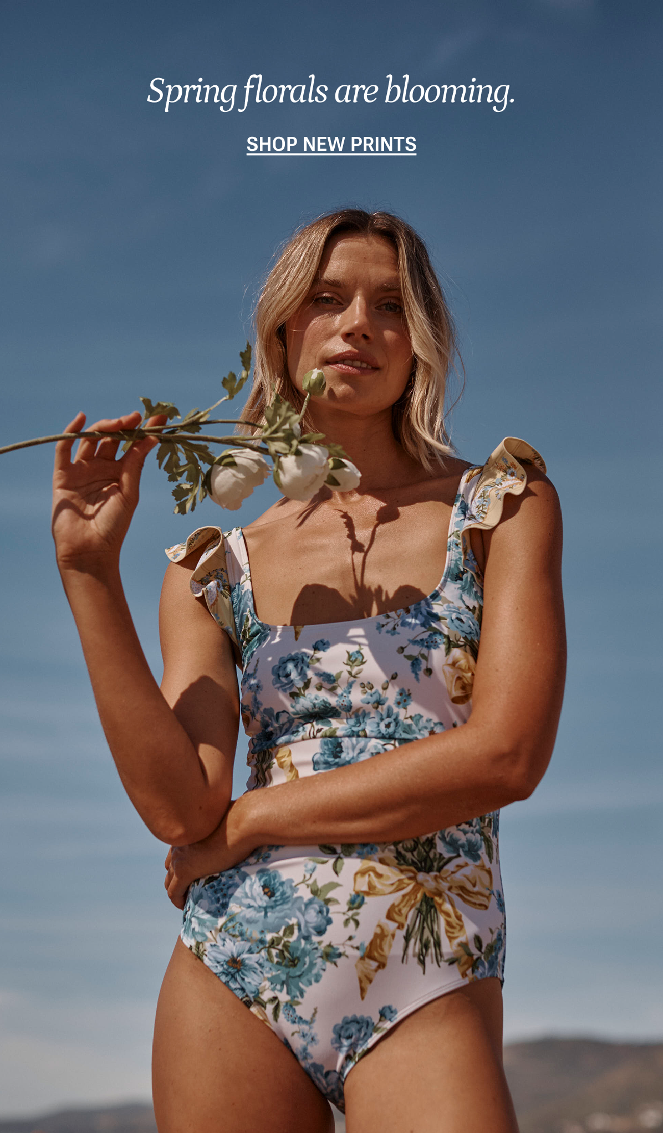 Model in Sidestroke One Piece Swimsuit in Sea Urchin (black)