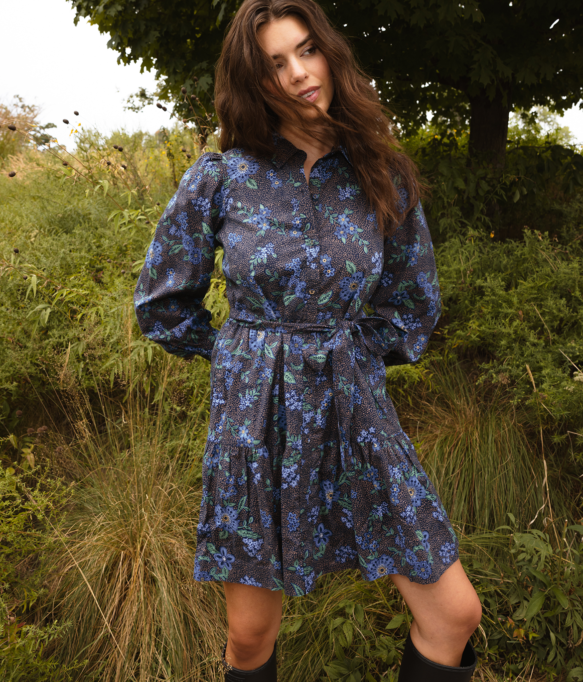 Fall Dresses Text: Model in Fall Dress, The Countryside Poplin Tiered Shirtdress - Rustic Floral in Midnight (blue floral print)