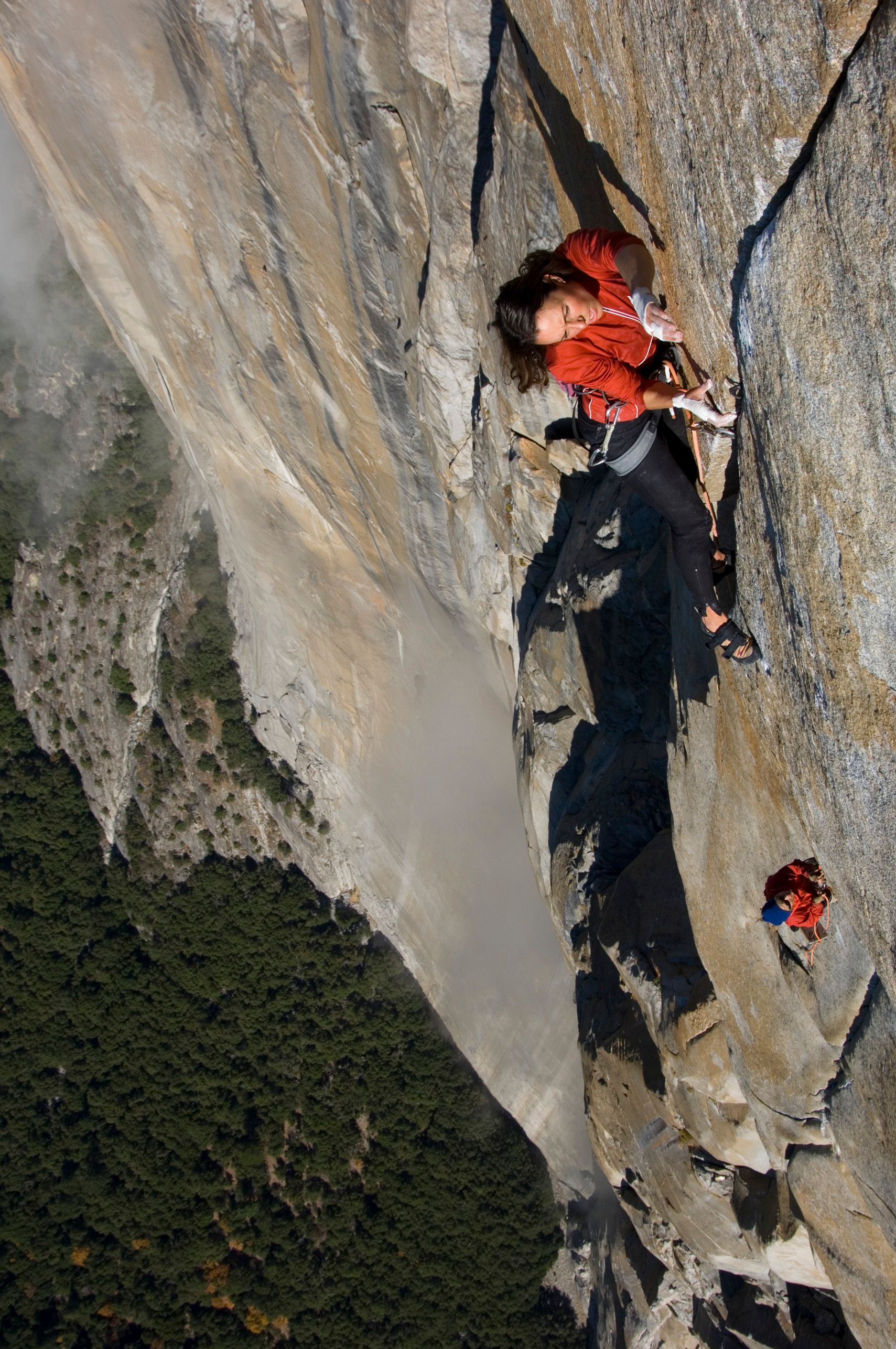Salathe Wall free, 2005. 2 of 3.
The most tenuous climbing was still ahead. I emerged almost dreamlike, laybacked the thin rounded crimps, and reached the final ledge, free at last. ✨ 
📷 Jimmy Chin