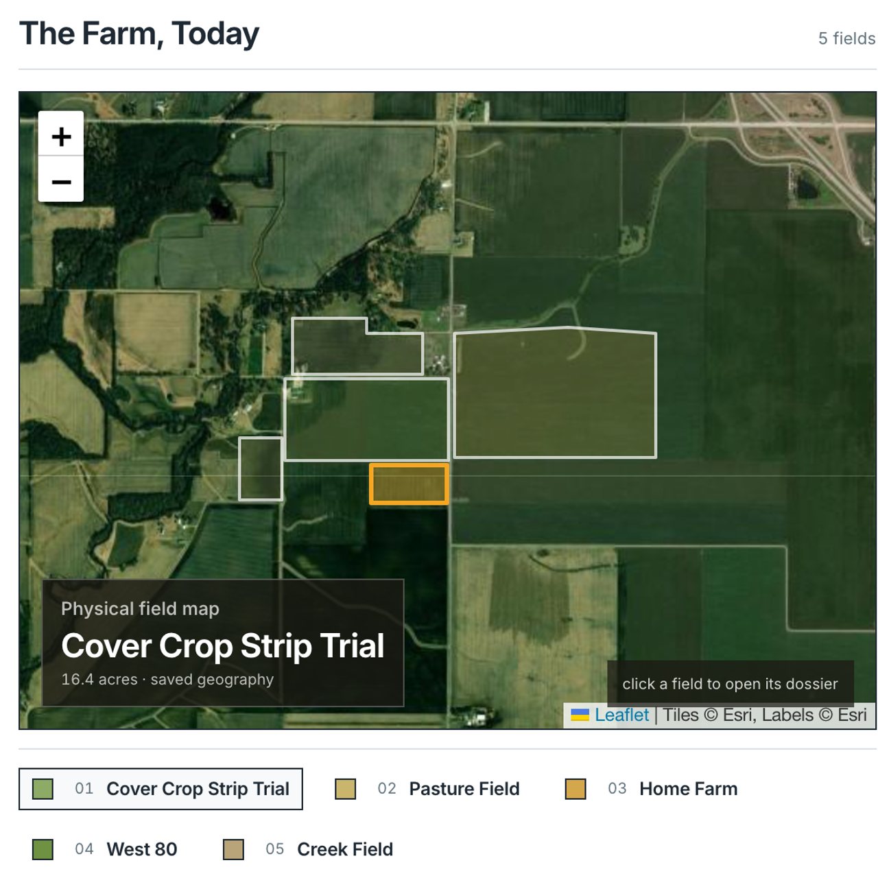 Five farm fields outlined in white on satellite imagery, with the small strip-trial field highlighted in orange.