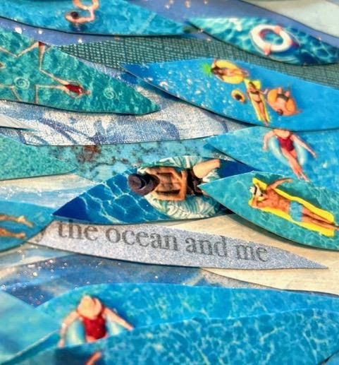 Close-up of blue paper waves printed with tiny swimmers and pool floats; one strip reads 'the ocean and me'.