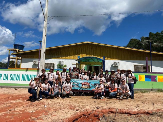 The Amazon Maker Mission team outside a community building in the Amazon Jungle