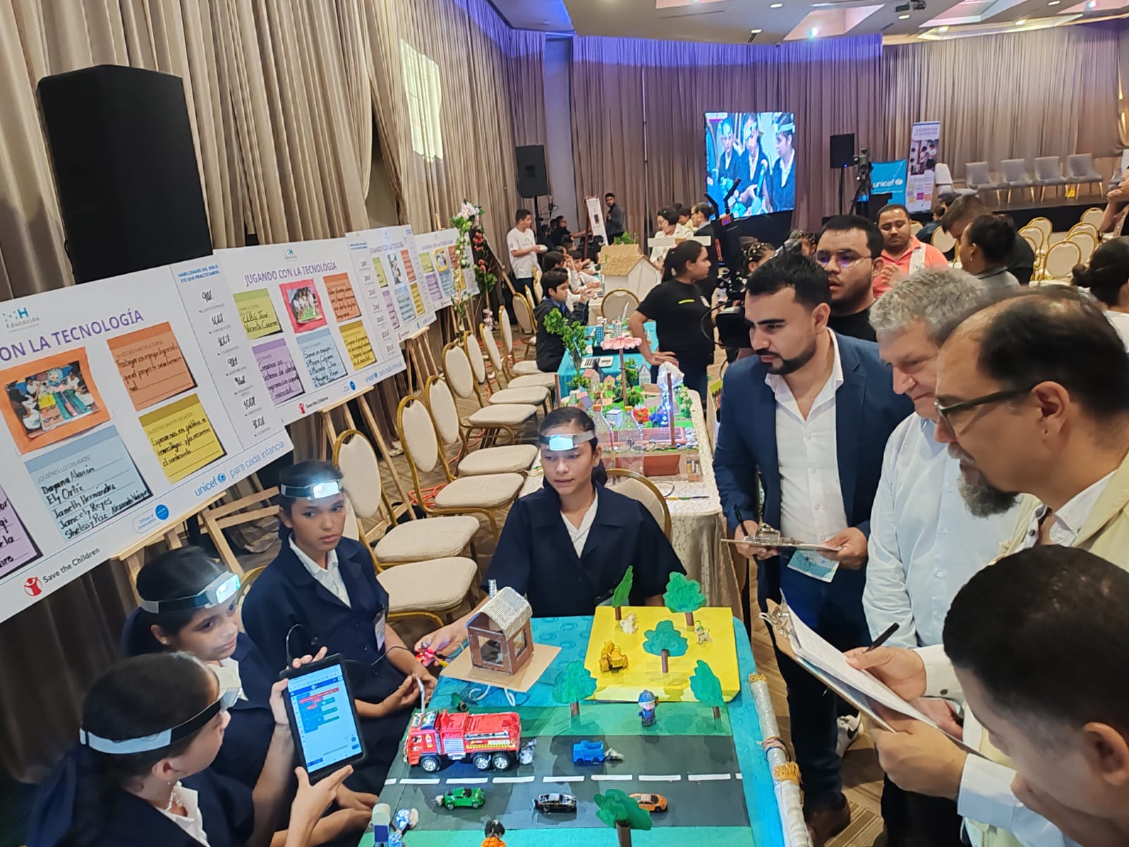 Students present their project to judges at a local competition.