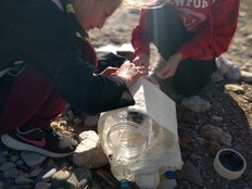 Students testing the Agean Sea Monitor near the sea.