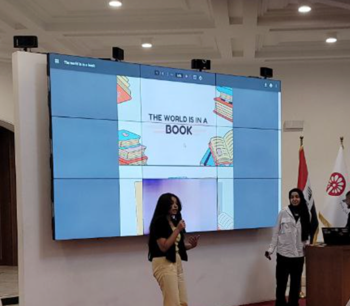 Students presenting The World is in a Book project.