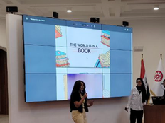 Students presenting The World is in a Book project.