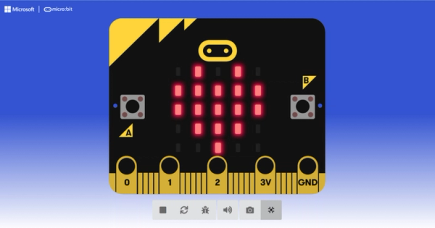 A screenshot showing the full screen simulator in the MakeCode website. The micro:bit shows a heart icon.