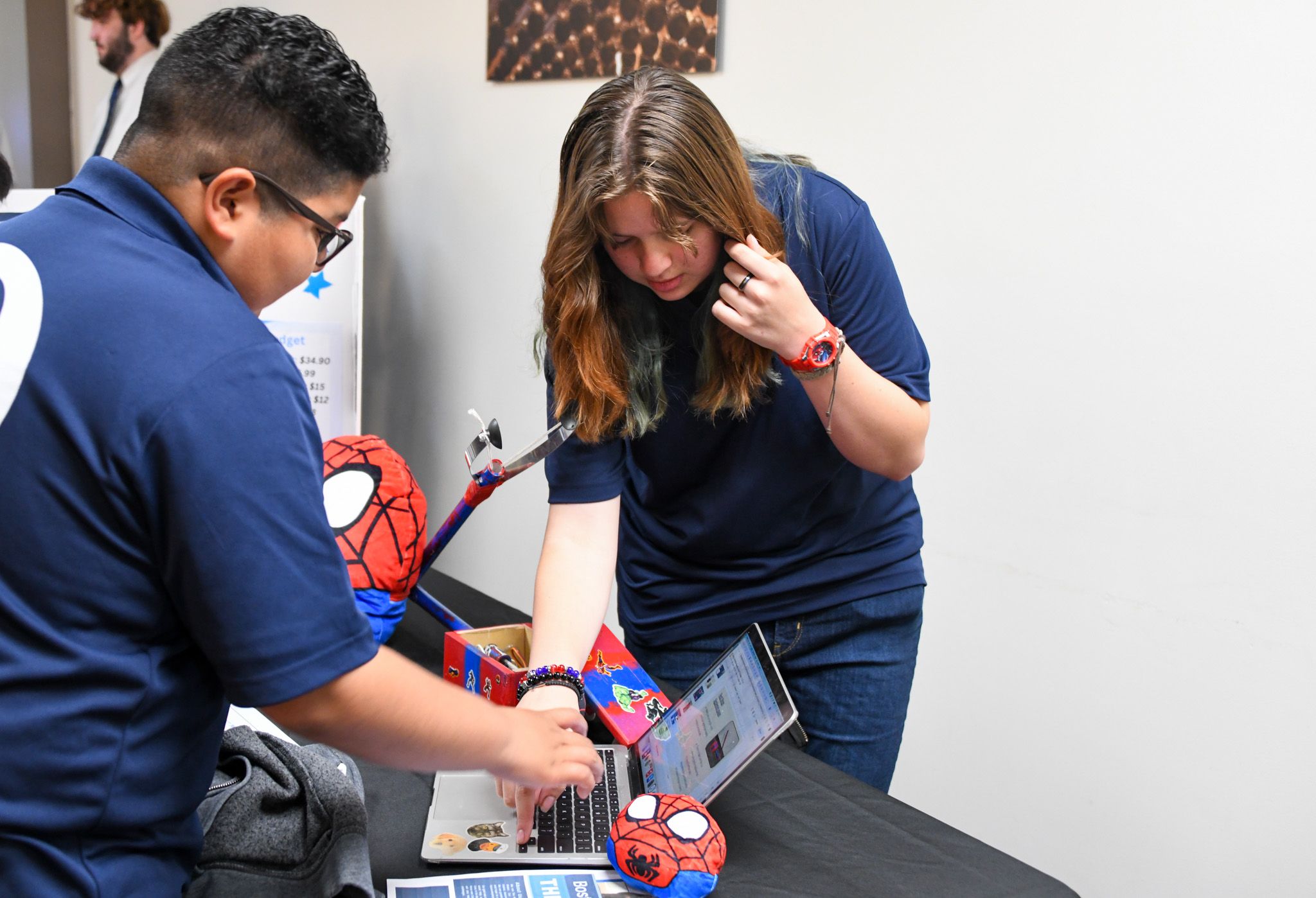 Students demonstrate how The Claw works.