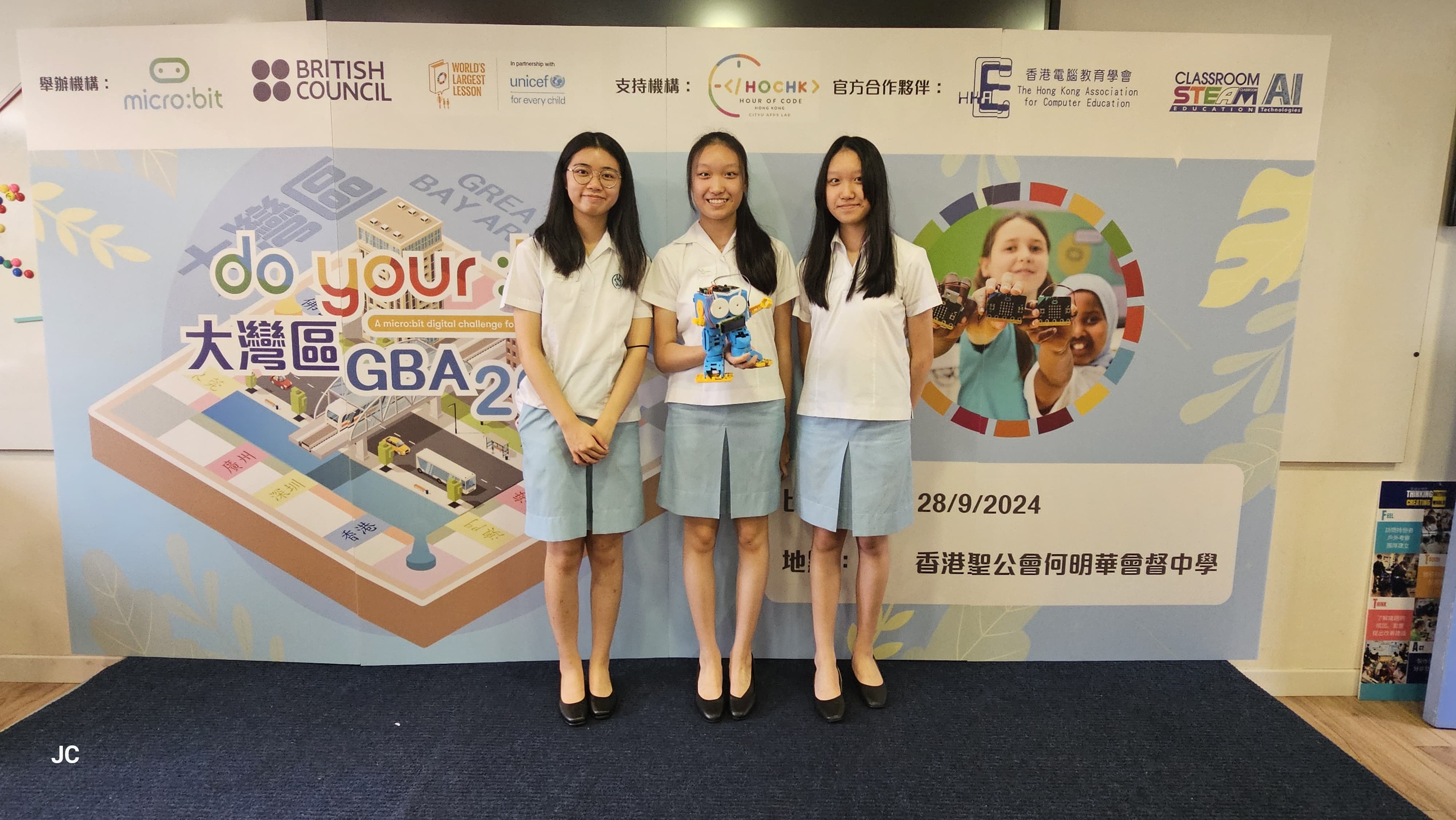 Students pose with their M&amp;M Mangrove micro:bit prototype.