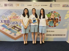 Students pose with their M&M Mangrove micro:bit prototype.