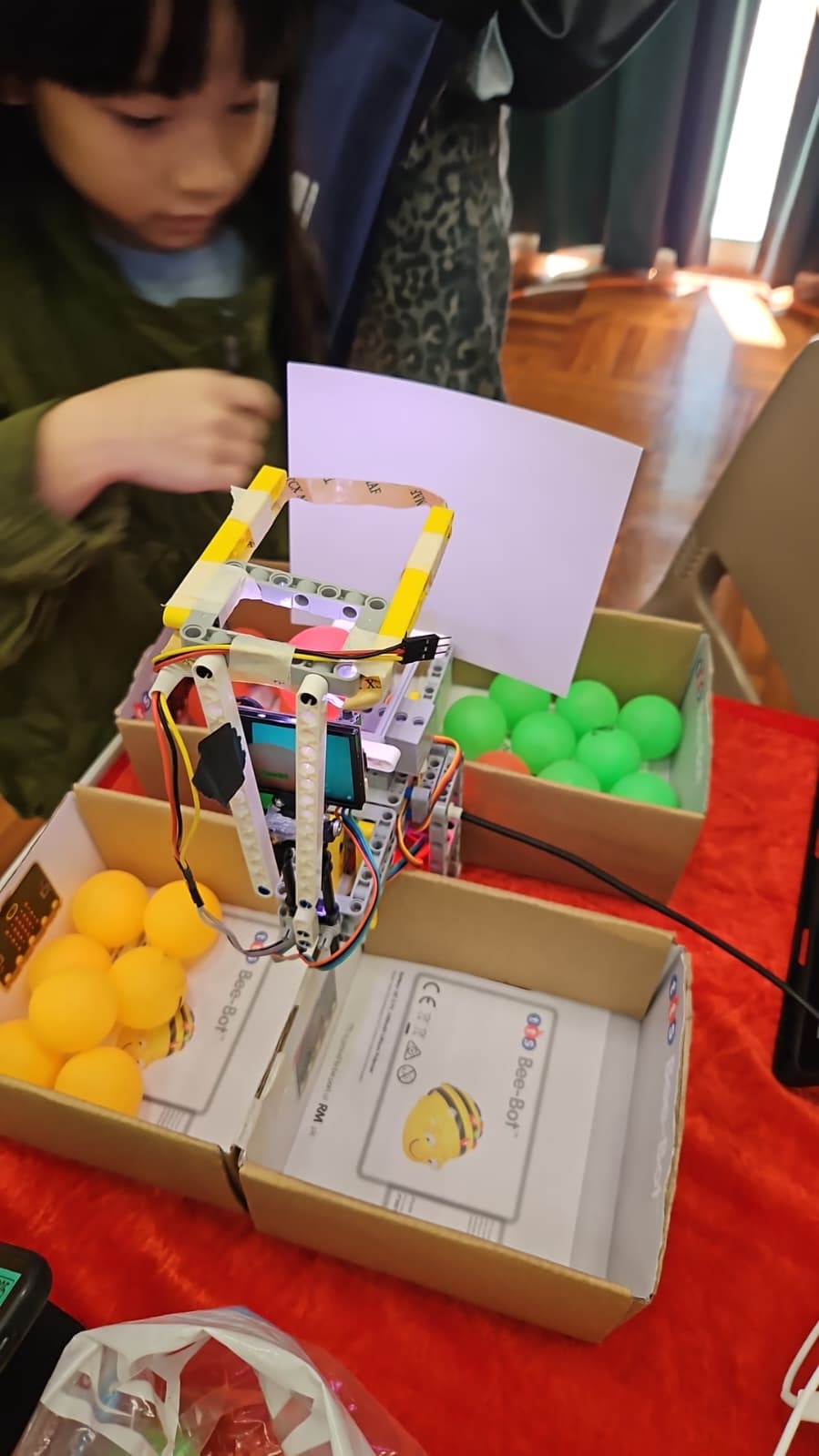 A student demonstrates how the FuitSort prototype works.