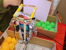 A student demonstrates how the FuitSort prototype works.