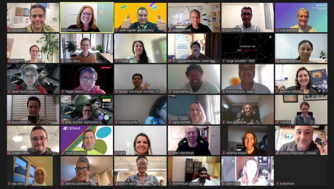Screenshot of a global Champion online meetup with attendees holding their micro:bits