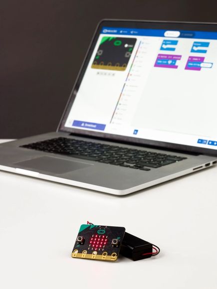 micro:bit on table with laptop