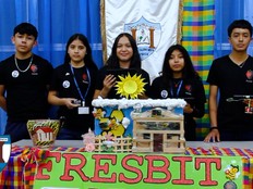 Students pose with a prototype of their project.