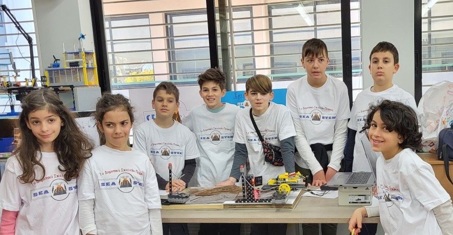 Students pose with their Underwater Volcano Monitoring project.