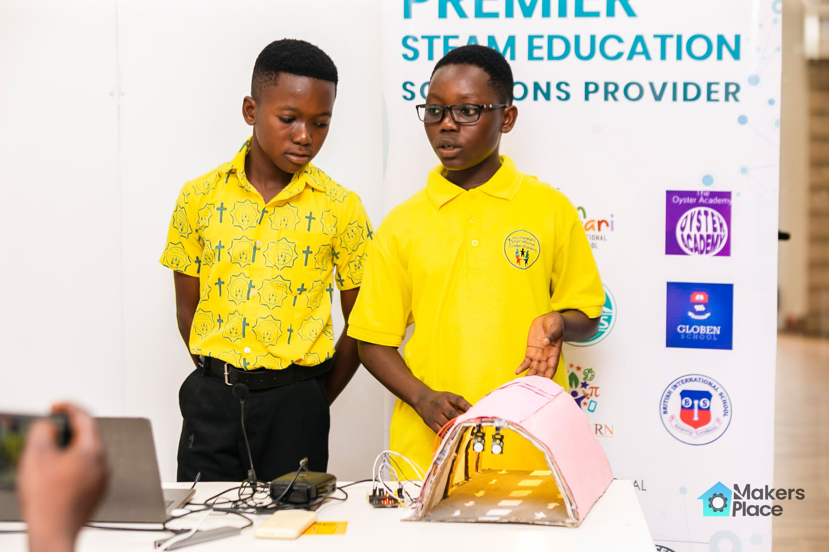 Students presenting the Smart Tunnel Lighting project.